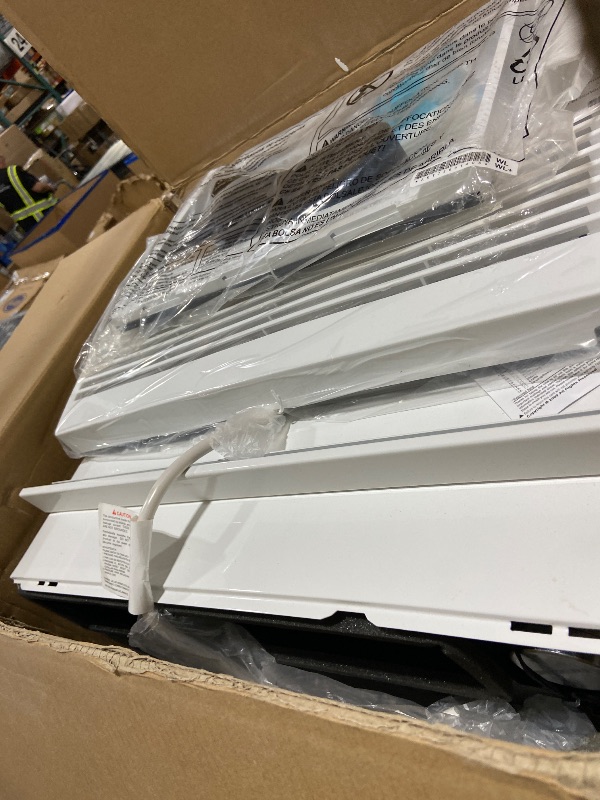 Photo 1 of LG 12,000 BTU Window Air Conditioner with Remote , WiFi App, Ultra-Quiet, Washable Filter, Cools 550 Sq. Ft., White (LW1217ERSM1)