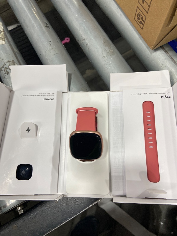 Photo 1 of Fitbit Versa 4 Fitness Smartwatch with Daily Readiness - 3-Month Google Health Premium Membership Included - GPS, 24/7 Heart Rate, 40+ Exercise Modes, Sleep Tracking - Pink Sand/Copper Rose