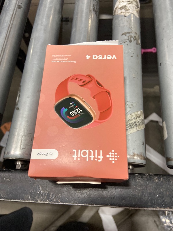 Photo 1 of Fitbit Versa 4 Fitness Smartwatch with Daily Readiness - 3-Month Google Health Premium Membership Included - GPS, 24/7 Heart Rate, 40+ Exercise Modes, Sleep Tracking - Pink Sand/Copper Rose