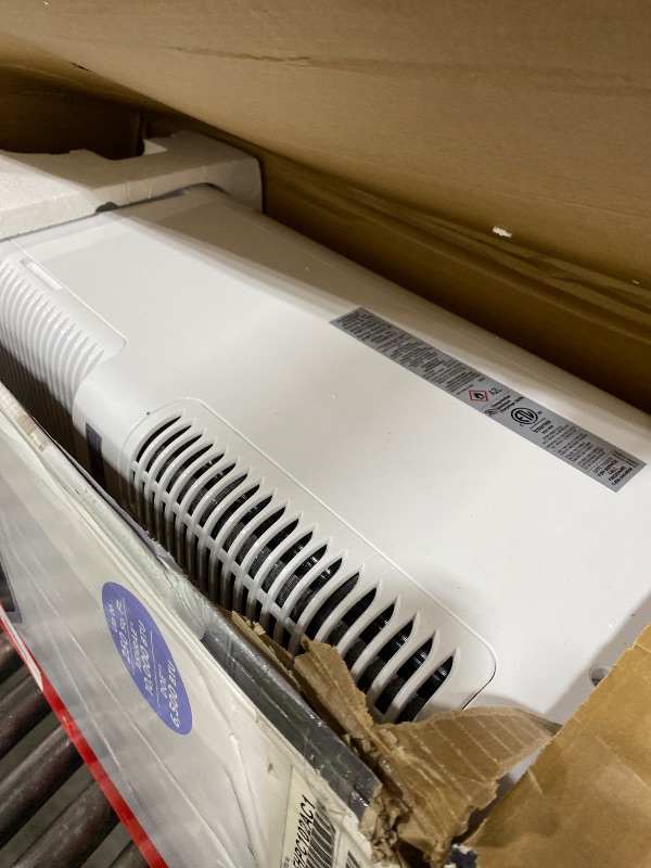 Photo 1 of DOES NOT COOL ******* Frigidaire 3-in-1 Portable Room Air Conditioner 10,000 BTU (ASHRAE) / 6,500 BTU (DOE), Cools Up to 450 Sq. Ft., Quiet Operation, Dehumidifying Dry Mode, White