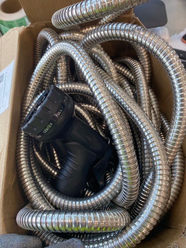 Photo 1 of *See Clerk Notes*Tuzoc Garden Hose 100FT Stainless Steel