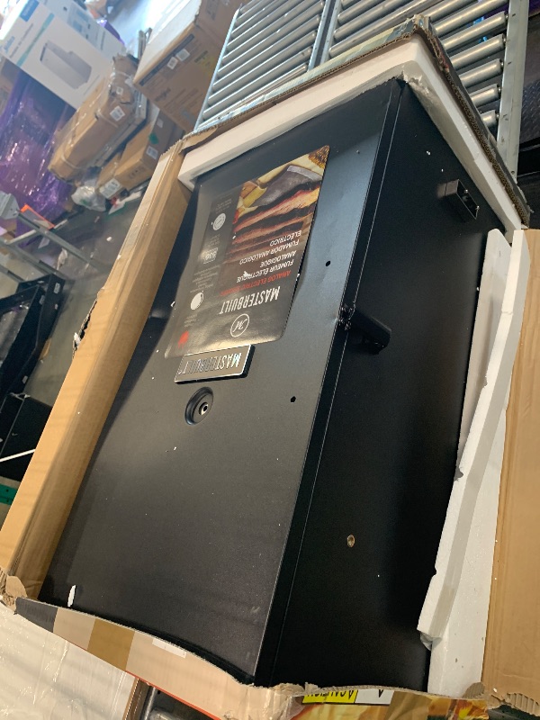 Photo 1 of ***MINIOR DENT ON ONE OF THE SIDES****
Masterbuilt® 30-inch Electric Vertical BBQ Smoker with Analog Temperature Control, Chrome Smoking Racks and 535 Cooking Square Inches in Black, Model MB20070210