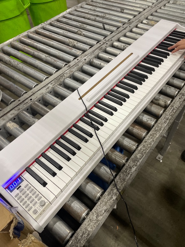 Photo 1 of **2 black keys and 1 white key dont work**KUMENG digital Piano 88 Key Semi Weighted Keyboard,Full-size Electric Piano for Beginners,with Sheet Music Stand,Pedal,Power Adapter,Headphone Mode,USB-MIDI (White)