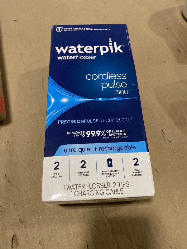 Photo 1 of Waterpik Cordless Pulse 3100 Rechargeable Portable Water Flosser for Teeth, Gums, Braces Care and Travel with 2 Flossing Tips, Waterproof for Shower Use, ADA Accepted, WF-20 White, Amazon Exclusive