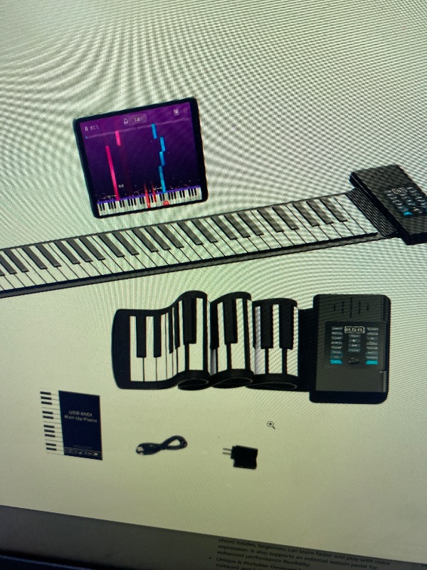 Photo 1 of KONIX 61 Key Roll Up Piano,Upgraded Portable Rechargeable Hand Roll Piano with Silicon Flexible Keyboard, MIDI Output, Headphone Connection, 128 Rhythms,Best Gift for Beginners