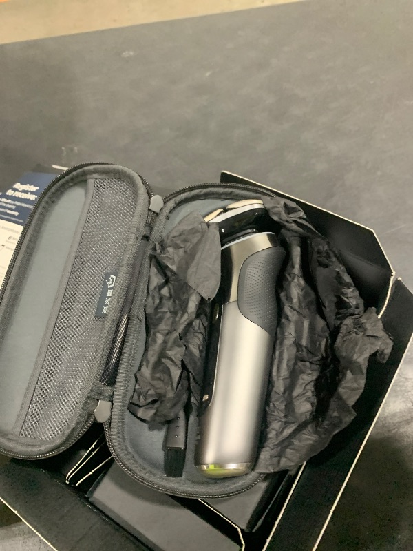 View 2 of Philips Norelco Shaver i9000 Prestige Ultra, Wet & Dry Electric Shaver, Dark Slate, SenseIQ Pro Technology, Triple Lift & Cut System, 360 Rotating NanoTech Precision Blades, Quick Clean Pod, XP9402/86