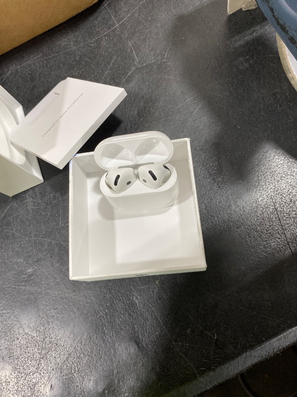 Photo 1 of Apple AirPods 4 Wireless Earbuds, Bluetooth Headphones, Personalized Spatial Audio, Sweat and Water Resistant, USB-C Charging Case, H2 Chip, Up to 30 Hours of Battery Life, Effortless Setup for iPhone