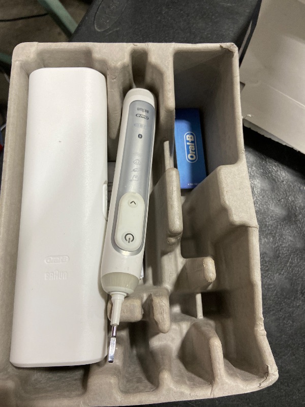 Photo 1 of NON-FUNCTIONAL, PARTS ONLY-----------------------------------Oral-B Genius X Limited Rechargeable Electric Toothbrush with 1 Replacement Brush Head, Travel Case, White