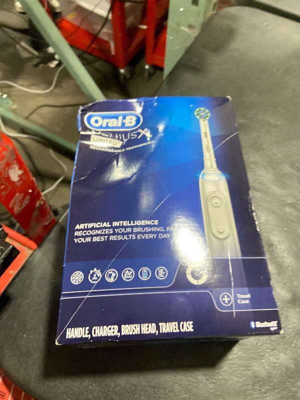 Photo 1 of NON-FUNCTIONAL, PARTS ONLY-----------------------------------Oral-B Genius X Limited Rechargeable Electric Toothbrush with 1 Replacement Brush Head, Travel Case, White