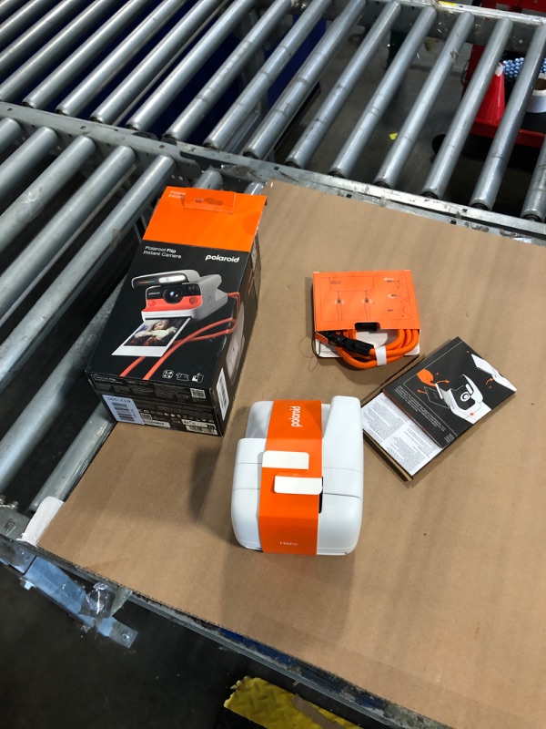 Photo 1 of ** no film**
Polaroid Flip Instant Camera + Color Film Bundle (16 Photos Included) - White (6652) - Hyperfocal 4-Lens System, Sonar autofocus, and Sence Analysis with Bluetooth paired Companion app
