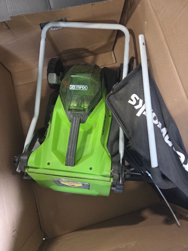 Photo 1 of *** USED MISSING PIECES**** **** SOLD FOR PARTS FINAL SALE*********Greenworks 80V 21” Brushless (Push) Cordless Electric Lawn Mower + (500 CFM) Axial Leaf Blower + 13” String Trimmer (75+ Compatible Tools), (2) 2.0Ah Batteries and 30 Minute Rapid Charger