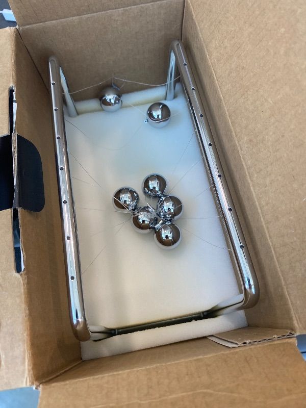 Photo 1 of [Pendulum is tangled badly] CERROPI Newtons Cradle Pendulum with 7 Balls, Classic Swing Newton Balance Ball, 30+ Sec Swingtime, Science Physics Gadget, Desk Toys & Office Gadgets for Desk Decorations
