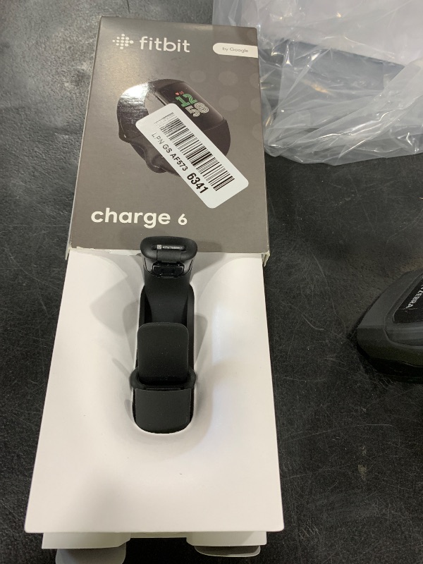 Photo 1 of Fitbit Charge 6 Fitness Tracker with Google Apps - Heart Rate on Exercise Equipment - 3-Month Google Health Premium Membership Included - Health Tools - Obsidian/Black - Small&Large Bands Included