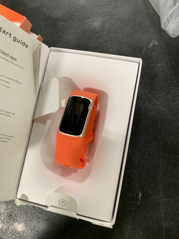 Photo 1 of Fitbit Charge 6 Fitness Tracker with Google Apps - Heart Rate on Exercise Equipment - 3-Month Google Health Premium Membership Included - Health Tools - Gold/Coral - Small&Large Bands Included