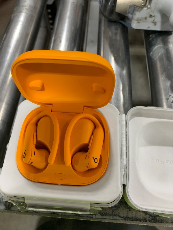 Photo 1 of Beats Powerbeats Pro 2 - Wireless Noise Cancelling Workout Earbuds with Secure- Fit Earhooks, Up to 45-Hour Battery with Charging Case, Sweat & Water Resistant, Heart Rate Monitoring - Electric Orange