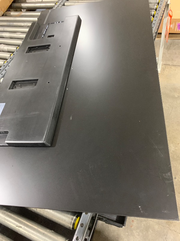 Photo 1 of Big ultra thin TV 