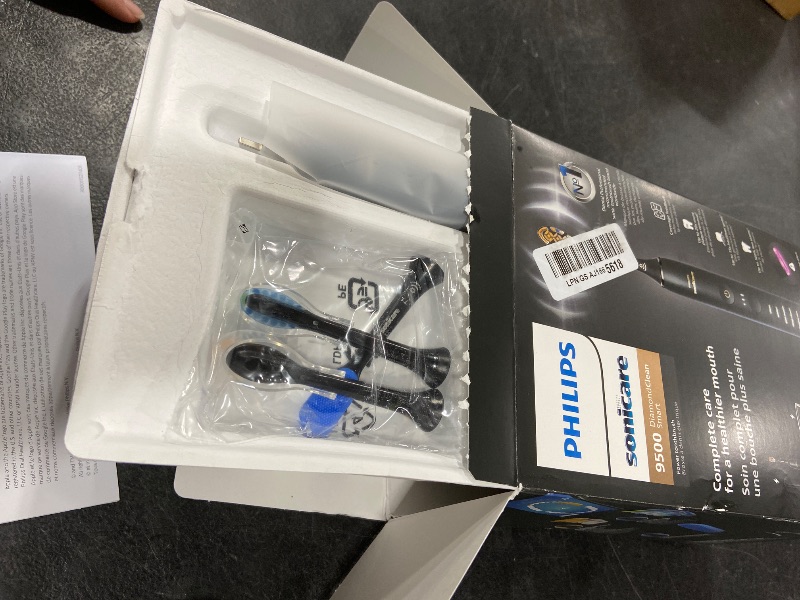 Photo 1 of Philips Sonicare DiamondClean Smart 9500 Electric Toothbrush - Sonic Toothbrush with App, Pressure Sensor, 15 Brushing Settings, Replacement Reminder, USB Charging Travel Case, Black, Model HX9923/11