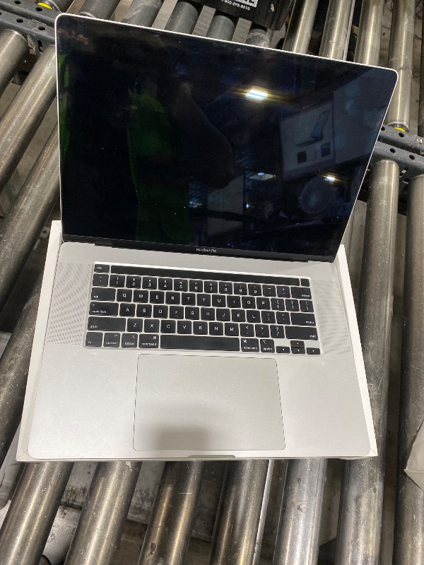 Photo 1 of 2019 Apple MacBook Pro (16-inch, 16GB RAM, 1TB Storage, 2.3GHz Intel Core i9) - Silver