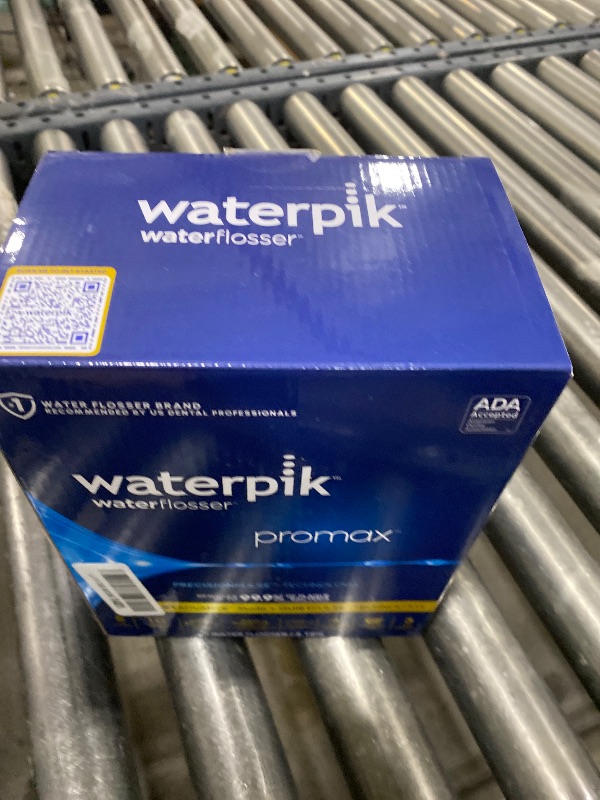 Photo 1 of Waterpik Promax Water Flosser with SmartAdvance Mode for Daily Gum Health and Cleaning Teeth, Braces, Implants, ADA Accepted, Small Quiet Design, Electric Flosser with 10 Settings, 5 Tips, WF-23
