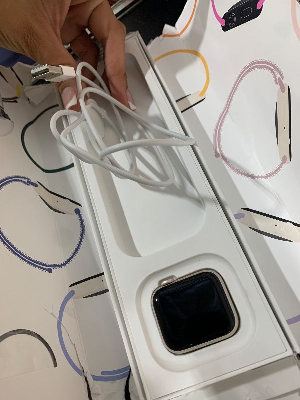 Photo 1 of product locked by previous owner 
Apple Watch SE 3 [GPS 40mm] Smartwatch with Starlight Aluminum Case with Starlight Sport Band - S/M. Fitness and Sleep Trackers, Heart Rate Monitor, Always-On Display, Water Resistant
