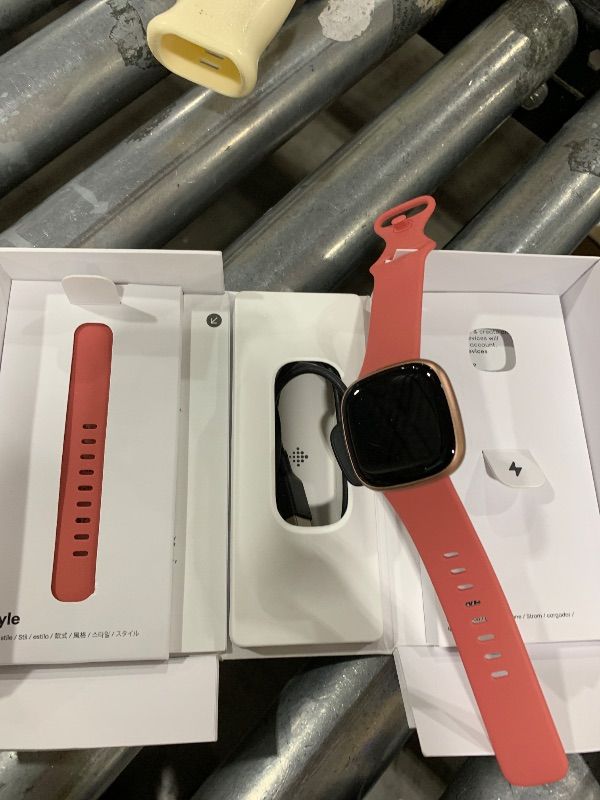 Photo 1 of Fitbit Versa 4 Fitness Smartwatch with Daily Readiness - 3-Month Google Health Premium Membership Included - GPS, 24/7 Heart Rate, 40+ Exercise Modes, Sleep Tracking - Pink Sand/Copper Rose