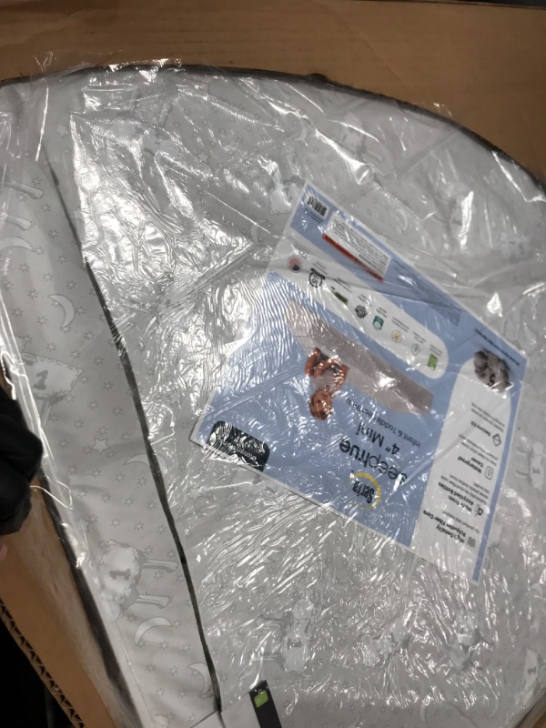 View 4 of **See picture for damage***Delta Children Serta SleepTrue Mini Crib Mattress - White