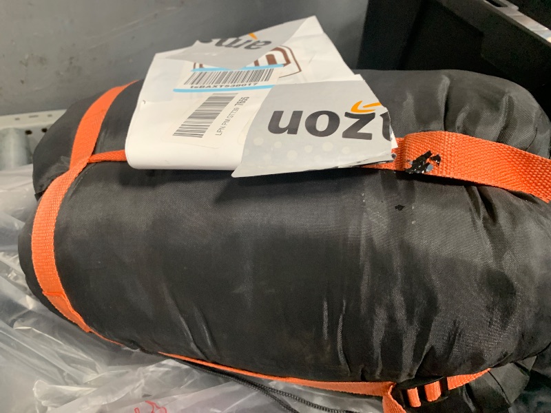 View 1 of Orange and black sleeping bag