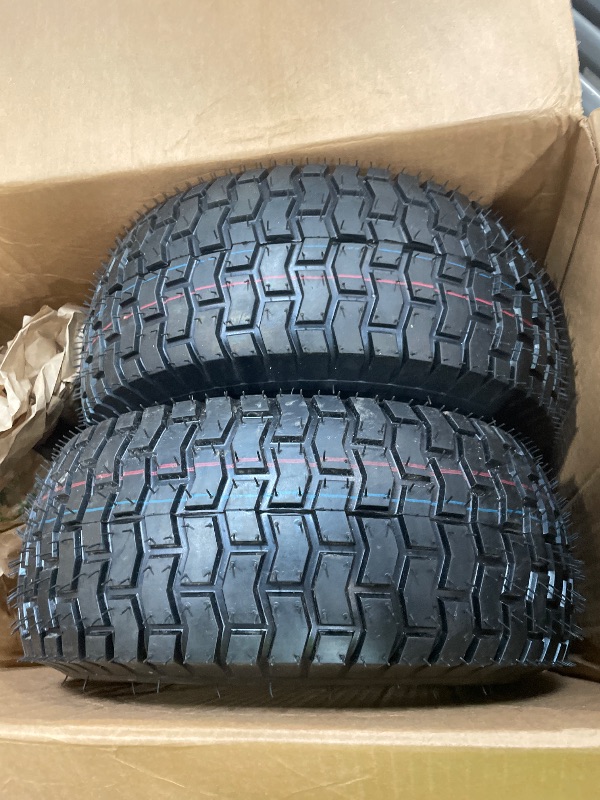 View 2 of 16x6.50-8 pneumatic tire and white wheel assembly featuring a centered bearing hub and grooved tread pattern. 2 PCS