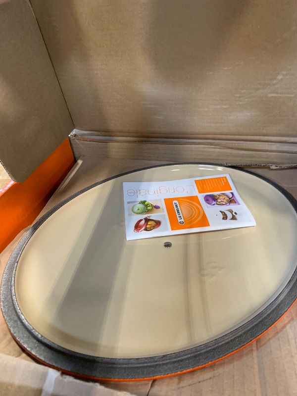 Photo 1 of ** CRACKED ON INSIDE** Le Creuset Enameled Cast Iron Signature Oval Dutch Oven, 8 qt., Flame