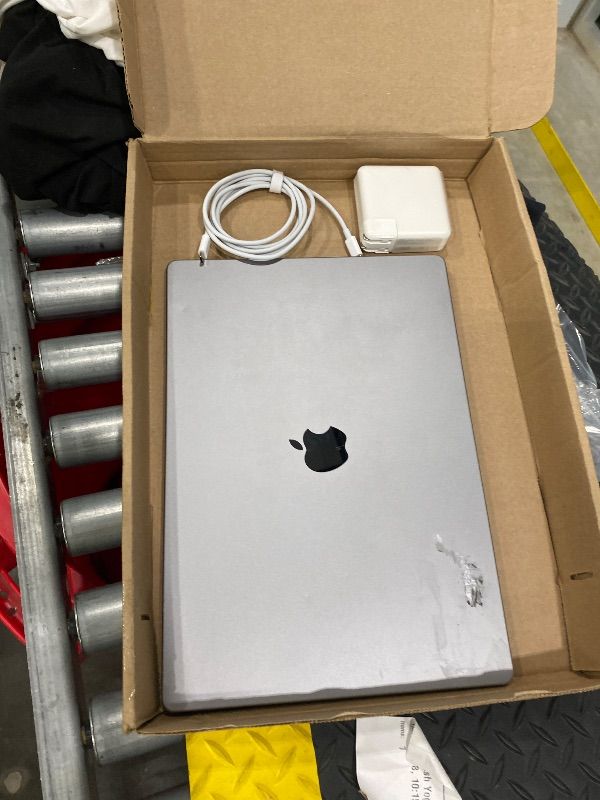 Photo 1 of [IMPORTANT: See Clerk Notes] Apple MacBook Pro Late 2021 with Apple M1 Pro chip (16-inch, 16GB RAM, 512GB SSD) Space Gray (Renewed)