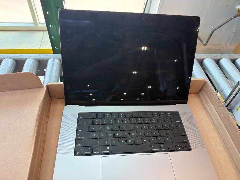 Photo 1 of [IMPORTANT: See Clerk Notes] Apple MacBook Pro Late 2021 with Apple M1 Pro chip (16-inch, 16GB RAM, 512GB SSD) Space Gray (Renewed)