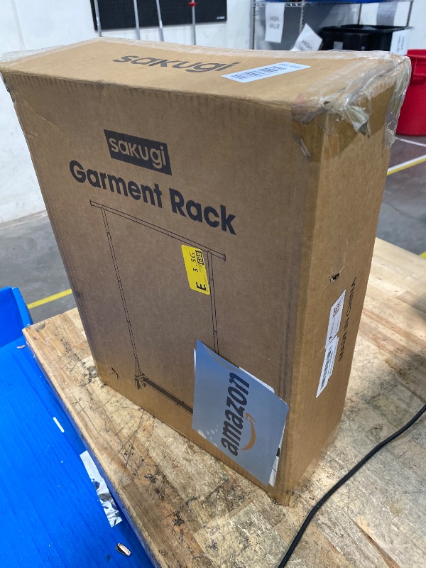 Photo 1 of **FACTORY SEALED**  Sakugi Heavy Duty Stainless Steel Rolling Clothes Rack with Mesh Shelf, Lockable Wheels & Anti-Slip Stoppers, Large Capacity Clothing Organizer for Bedroom, Laundry Room, 42.5" x 16.5" x 65.9", Silver