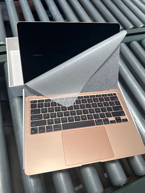 View 3 of **PARTS ONLY/SEE NOTES** 2020 Apple MacBook Air Laptop: Apple M1 Chip, 13” Retina Display, 8GB RAM, 256GB SSD Storage, Backlit Keyboard, FaceTime HD Camera, Touch ID. Works with iPhone/iPad; Gold