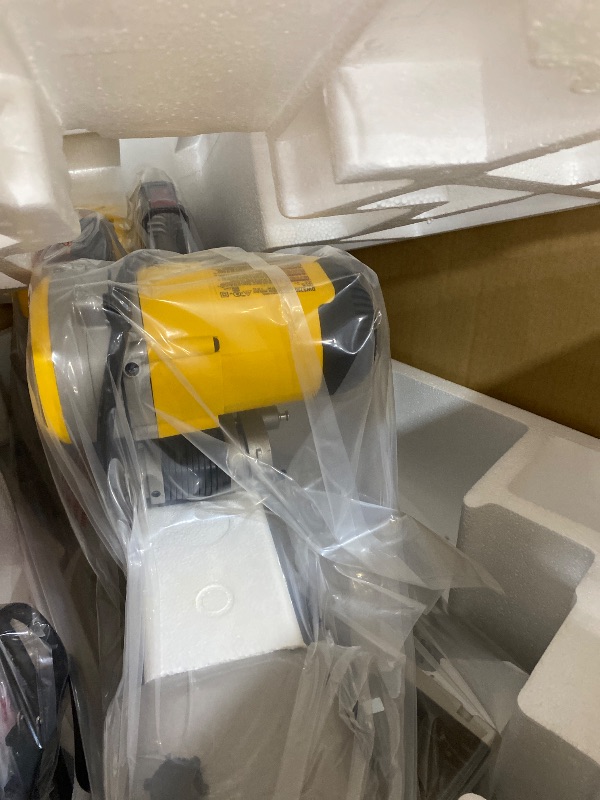 Photo 1 of DEWALT Miter Saw, 12-inch Double Bevel Sliding Compound Miter Saw with XPS LED Shadow Light System, Includes Blade Wrench, Material Clamp and Dust Bag (DWS780)