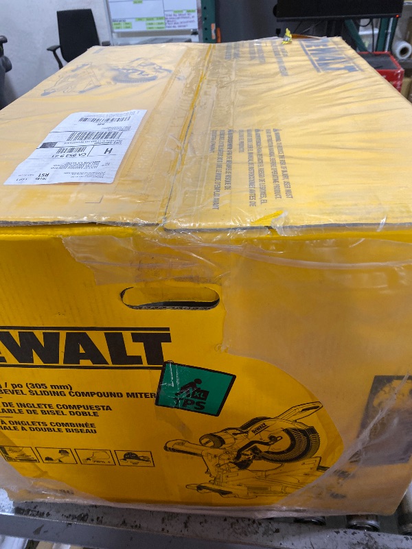Photo 1 of DEWALT Miter Saw, 12-inch Double Bevel Sliding Compound Miter Saw with XPS LED Shadow Light System, Includes Blade Wrench, Material Clamp and Dust Bag (DWS780)