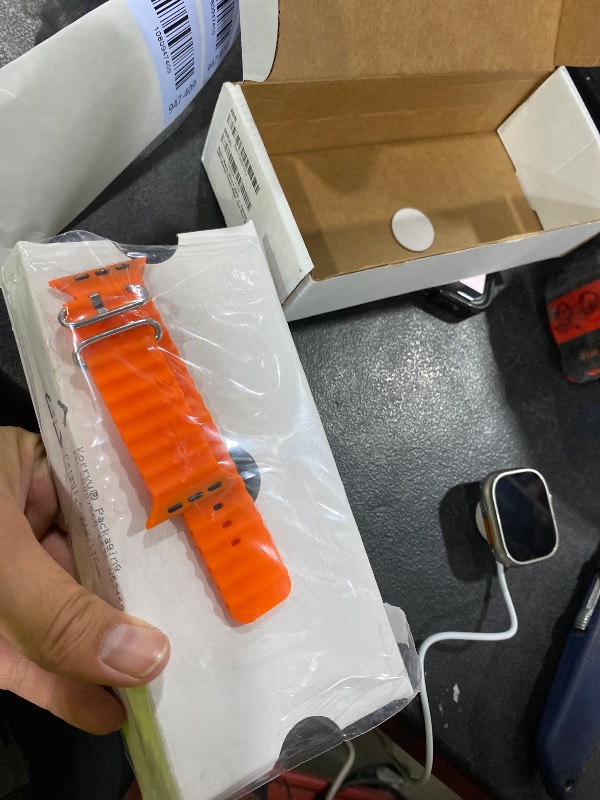Photo 1 of Apple Watch Ultra 2 [GPS + Cellular 49mm] Smartwatch with Rugged Titanium Case & Orange Ocean Band. Fitness Tracker, Precision GPS, Action Button, Extra-Long Battery Life, Bright Retina Display(doesn’t charge)