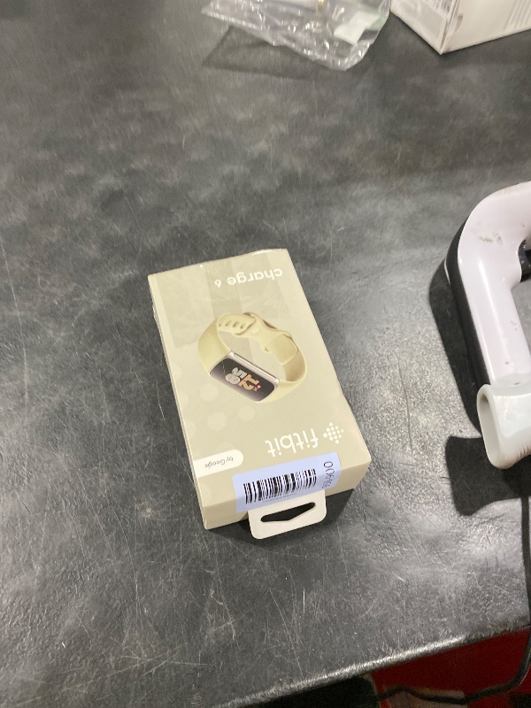 Photo 1 of Fitbit Charge 6 Fitness Tracker with Google Apps - Heart Rate on Exercise Equipment - 3-Month Google Health Premium Membership Included - Health Tools - Porcelain/Silver - Small&Large Bands Included