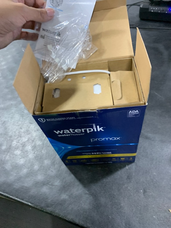 Photo 1 of Waterpik Promax Countertop Water Flosser, SmartAdvance, 10 Settings, 5 Tips