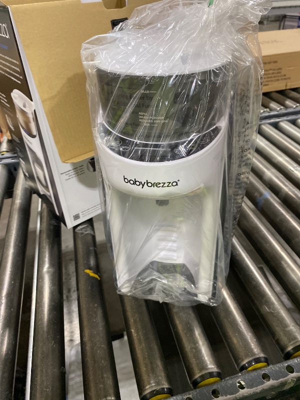 Photo 1 of Baby Brezza New and Improved Formula Pro Advanced Formula Dispenser Machine - Automatically Mix a Warm Formula Bottle Instantly - Easily Make Bottle with Automatic Powder Blending, White