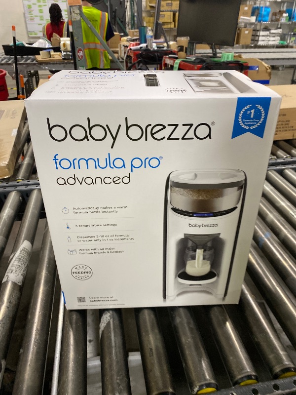 Photo 1 of Baby Brezza New and Improved Formula Pro Advanced Formula Dispenser Machine - Automatically Mix a Warm Formula Bottle Instantly - Easily Make Bottle with Automatic Powder Blending, White
