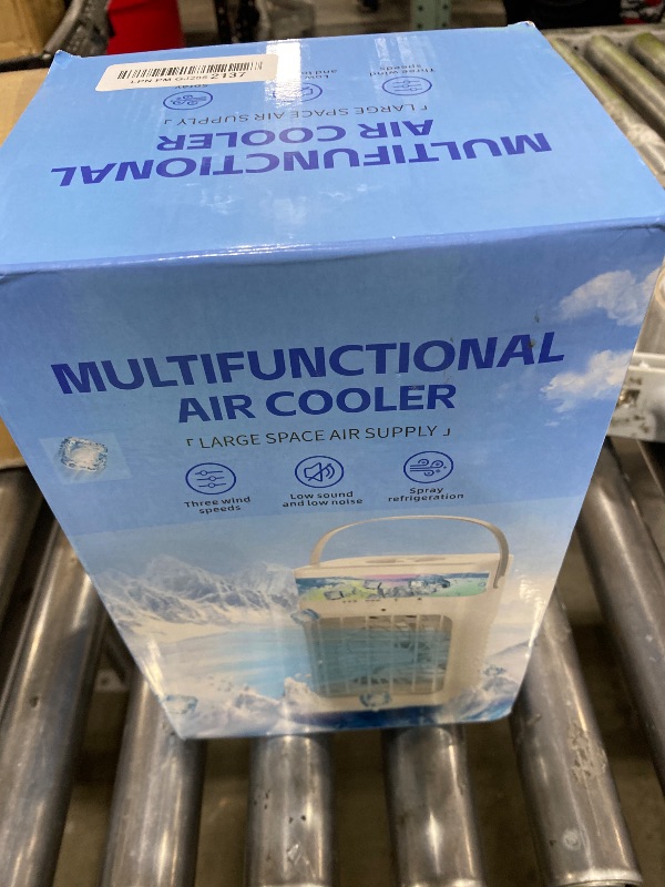 Photo 1 of Portable Air Conditioner, Cooling Fan 3 Speeds & 3 Modes Personal Cooling Fan Mini Air Conditioner Fan with Remote, 1500ML Water Tank, Night Light, No battery, for Home Office Bedroom