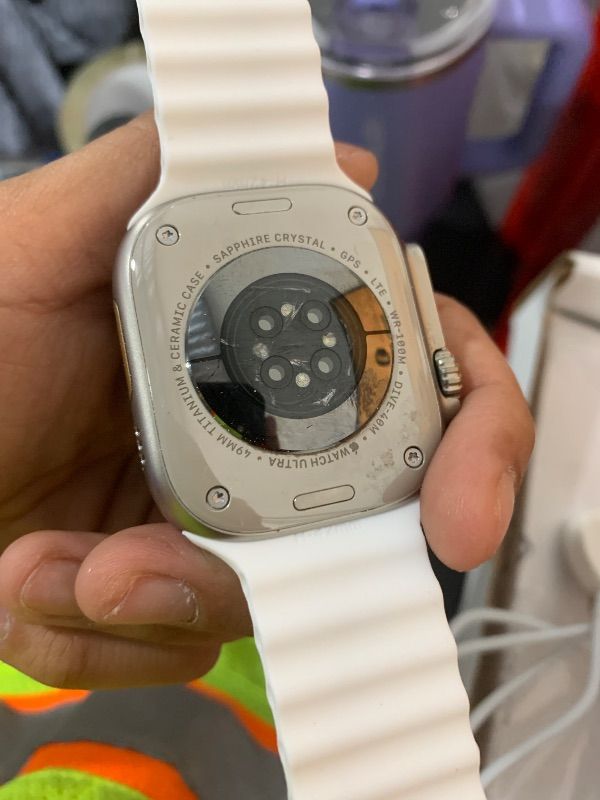 Photo 1 of Apple Watch Ultra 2 [GPS + Cellular 49mm] Smartwatch with Rugged Titanium Case & White Ocean Band. Fitness Tracker, Precision GPS, Action Button, Extra-Long Battery Life, Bright Retina Display