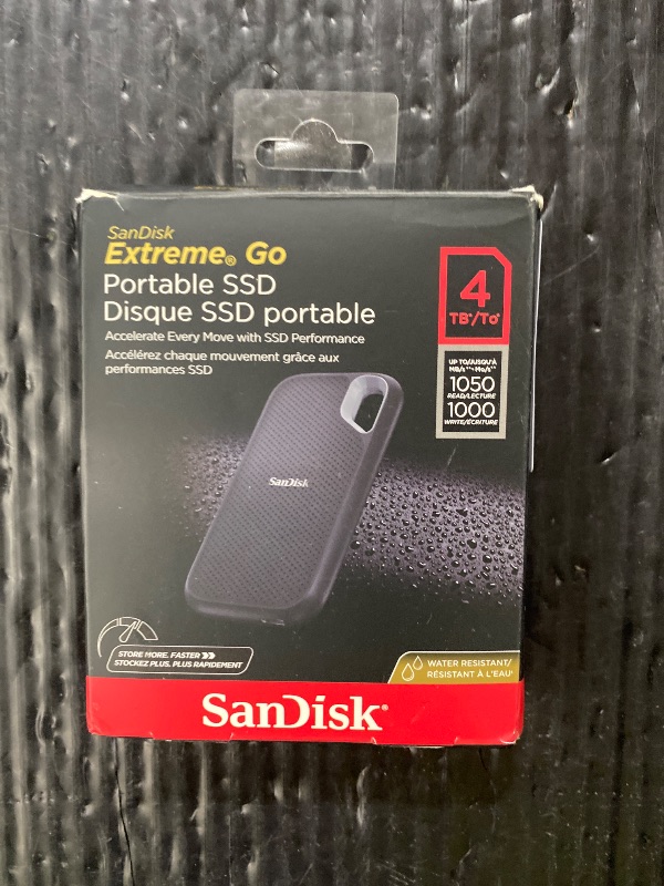 Photo 1 of SANDISK 4TB Extreme Portable SSD (Old Model) - Up to 1050MB/s, USB-C, USB 3.2 Gen 2, IP65 Water and Dust Resistance, Updated Firmware - External Solid State Drive - SDSSDE61-4T00-G25