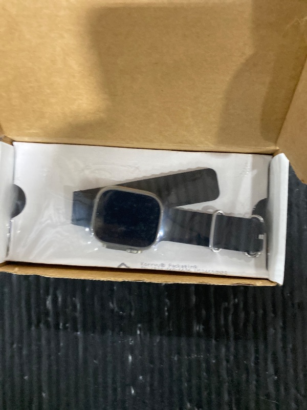 Photo 1 of Apple Watch Ultra [GPS + Cellular 49mm] Titanium Case with Midnight Ocean Band, One Size (Renewed)