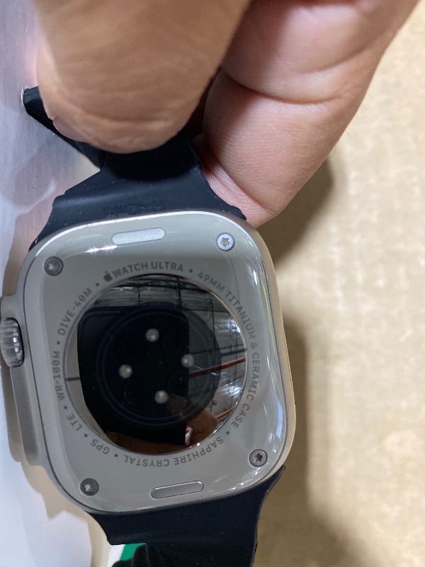 Photo 1 of Apple Watch Ultra [GPS + Cellular 49mm] Titanium Case with Midnight Ocean Band, One Size (Renewed Premium)