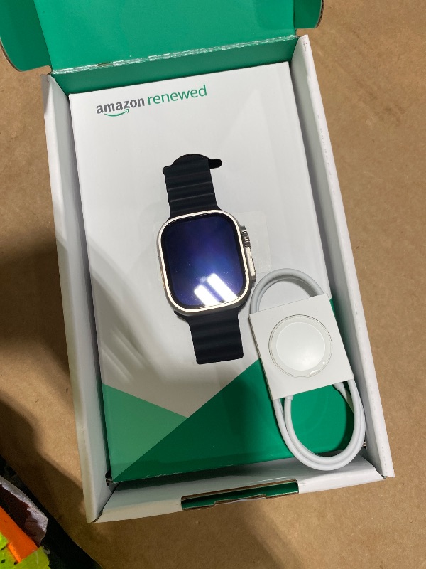 Photo 1 of Apple Watch Ultra [GPS + Cellular 49mm] Titanium Case with Midnight Ocean Band, One Size (Renewed Premium)