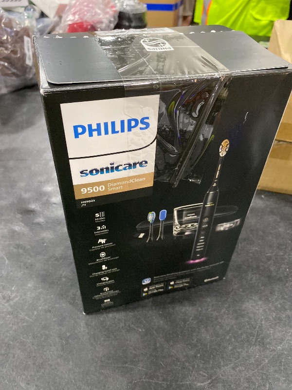 Photo 1 of Philips Sonicare DiamondClean Smart 9500 Electric Toothbrush - Sonic Toothbrush with App, Pressure Sensor, 15 Brushing Settings, Replacement Reminder, USB Charging Travel Case, Black, Model HX9923/11