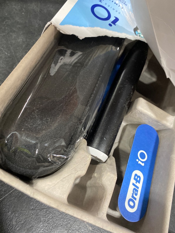 Photo 1 of Oral-B iO Series 3 Limited Deep Clean Rechargeable Electric Toothbrush for Adults, Black, 3 Modes, Smart Pressure Sensor, Plaque Removal and Gum Care, 2 Replacement Brush Heads, Travel Case