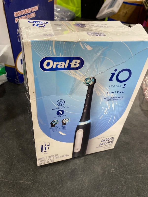 Photo 1 of Oral-B iO Series 3 Limited Deep Clean Rechargeable Electric Toothbrush for Adults, Black, 3 Modes, Smart Pressure Sensor, Plaque Removal and Gum Care, 2 Replacement Brush Heads, Travel Case
