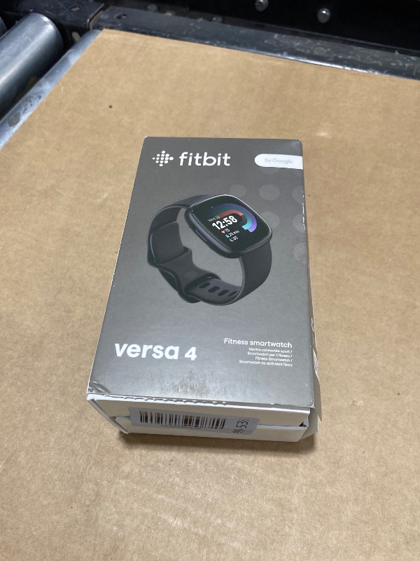 Photo 1 of Fitbit Versa 4 Fitness Smartwatch with Daily Readiness - 3-Month Google Health Premium Membership Included - GPS, 24/7 Heart Rate, 40+ Exercise Modes, Sleep Tracking - Black/Graphite